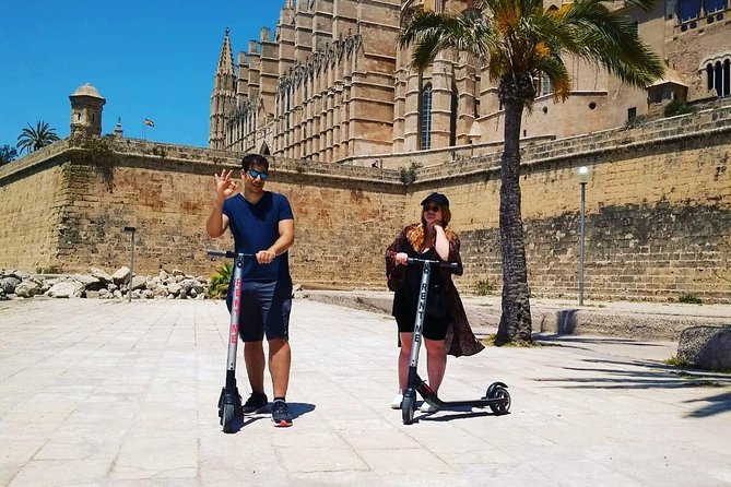 1 Hour Electric Scooter Tour in Palma - Palau de l’Almudaina and the power beside the sea