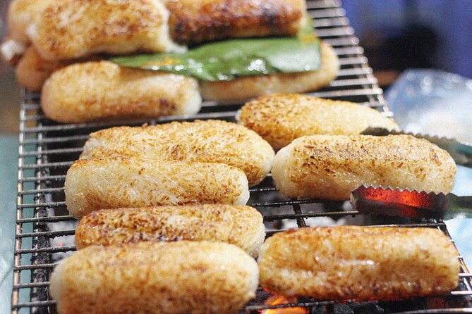 12 Tasting Street Food & Sightseeing By Scooter with Student - A fast, friendly introduction to Ho Chi Minh City