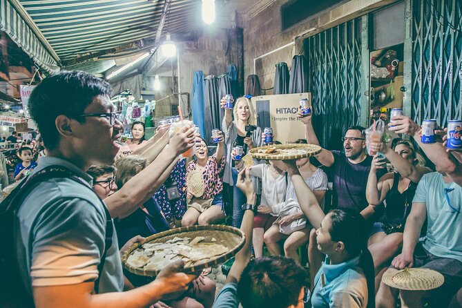 12 Tasting Street Food & Sightseeing By Scooter with Student - Riding safely through five districts