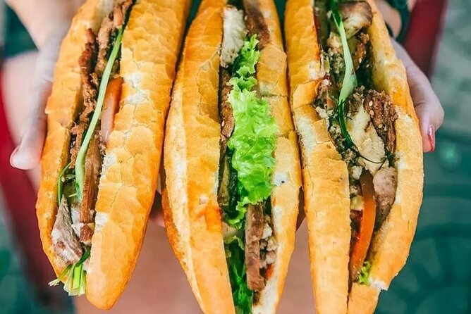 12 Tasting Street Food & Sightseeing By Scooter with Student - What the $30 price really covers
