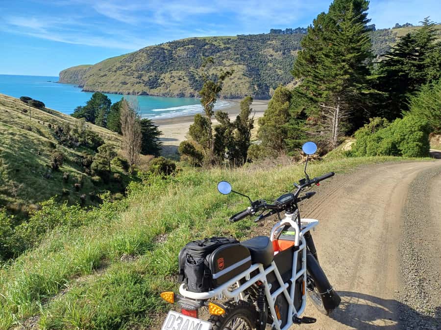 Akaroa: Lonely Beach Trail by E-Scooter. selfguided day out - Okains Bay Store for a simple food stop