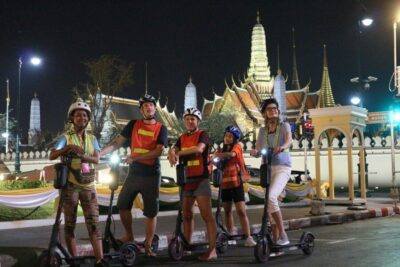 E-Scooter Night Tour with Local Street Food