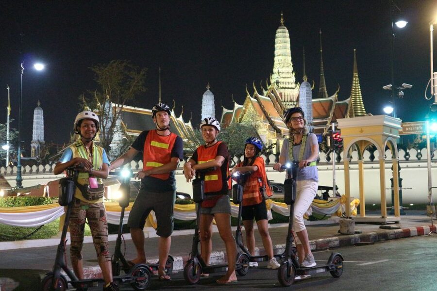 Bangkok: E-Scooter Night Tour with Local Street Food - First rides through quieter Bangkok streets