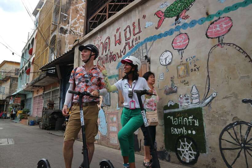 Bangkok: Riverside E-Scooter Adventure with StreetFood Snack - Tha Din Daeng Market and the taste of daily Bangkok