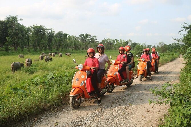 Beautiful Female Riders Vespa Red River Countryside Tour 5 Hours - From Hanoi Streets to Red River Fields