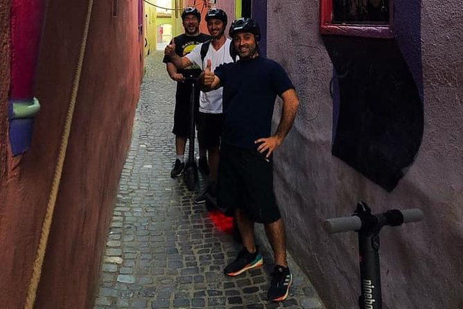 Brasov Old Town Guided Tour With Electric Scooters - One full hour in Brasov Historical Center