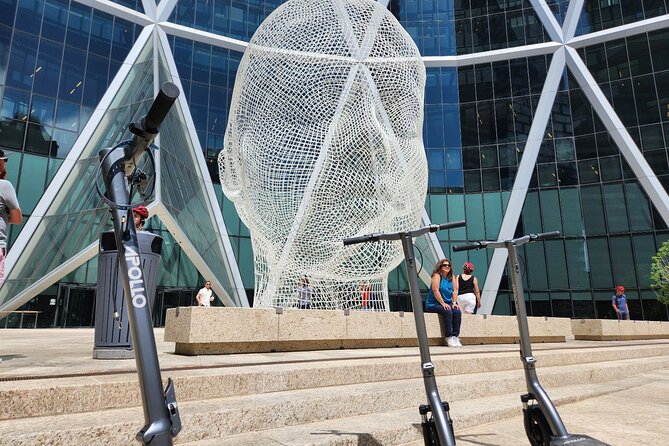 Calgary City Highlights 2 Hour E-Scooter Tour - Olympic Plaza and the Central Library