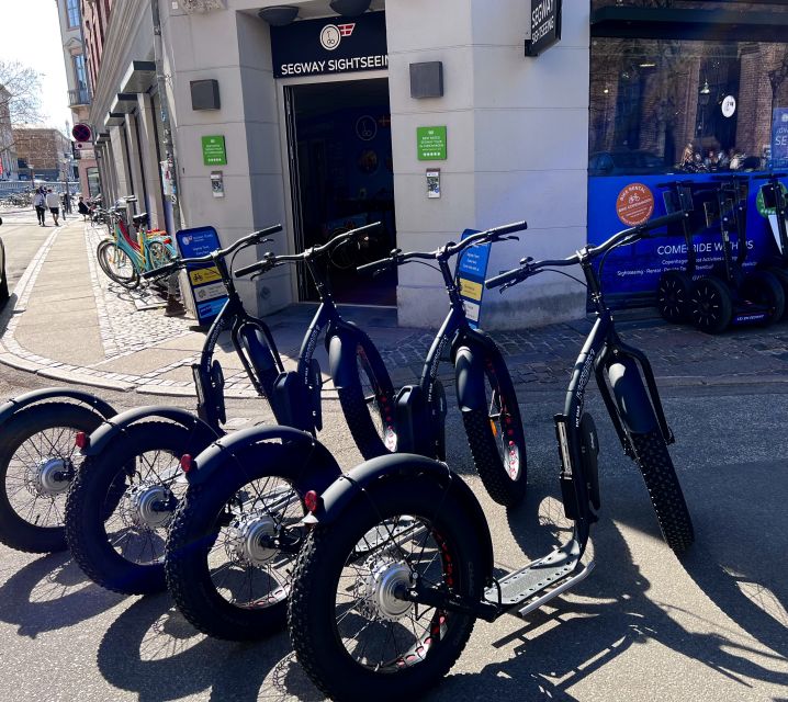 Copenhagen: Guided E-Scooter KickBike Tour- All Highlights - Starting at Nikolaj Plads and reaching the old center