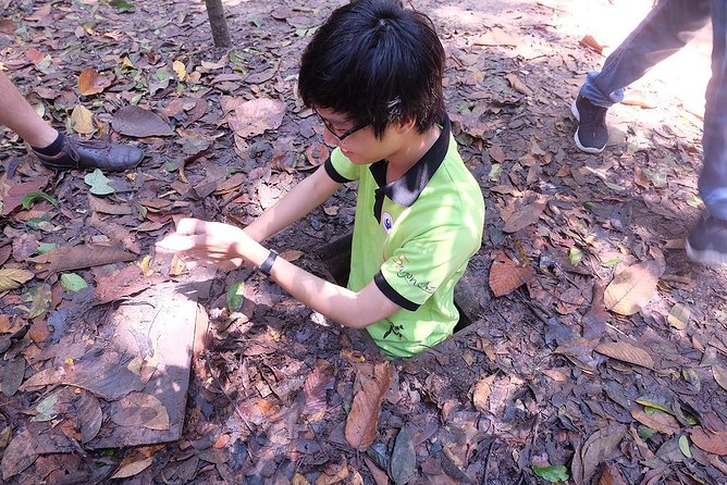 Cu Chi Tunnels By Motorbike and Scooter - A rubber tree farm adds local context