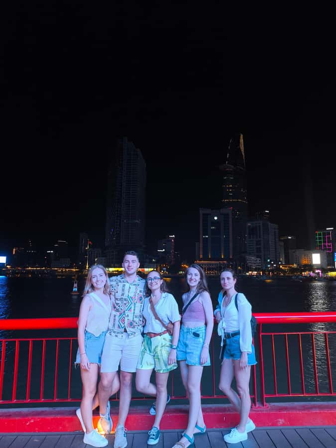 Discover Saigon Hidden Spots on Night Motorbike Adventure - A bánh mì break with a local drink
