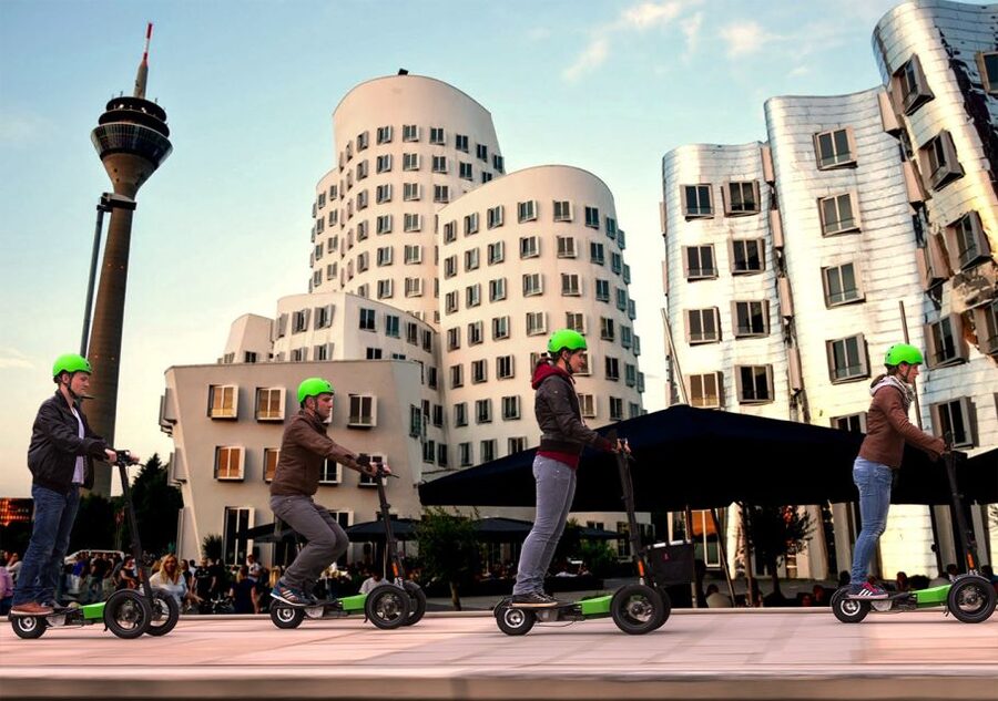 Düsseldorf: E-Scooter City Tour - Andreas Quartier, where old and new meet
