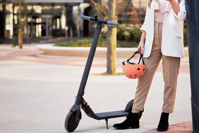 Electric Kick scooter Rental in Nice - Riding along the Nice boulevard
