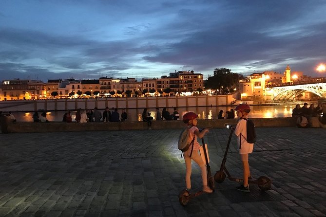Electric Scooter Rental Seville - Returning past the Royal Tobacco Factory
