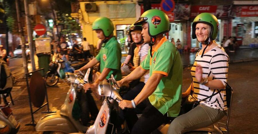 Enjoy Hanoi Like a Local - Vespa & Street Food Tour by Night - French Quarter architecture and Hanoi’s grand night face