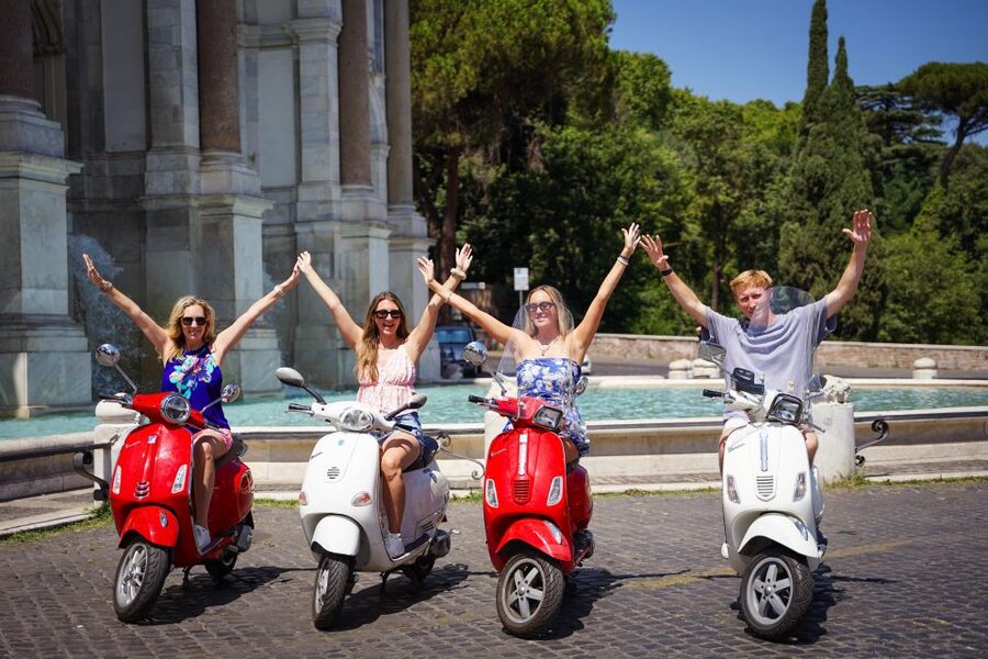 Explore city on Vespa with Professional Photographer - Riding between the landmarks