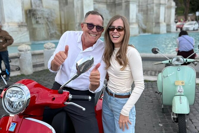 Explore Rome By Vespa - The Colosseum from the Roman streets