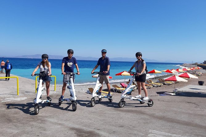 Explore the new town and the medieval town of Rhodes on scooters - 3 hours - Starting at Mandraki Harbour