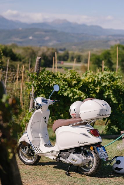 Explore the Rolling Hills of Lucca on a Vespa 125 Primavera - Starting at the small red shop