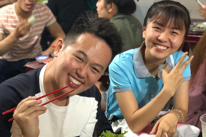 Exploring Saigon by Scooter, Day or Night - Seeing District 1 from the back of a scooter
