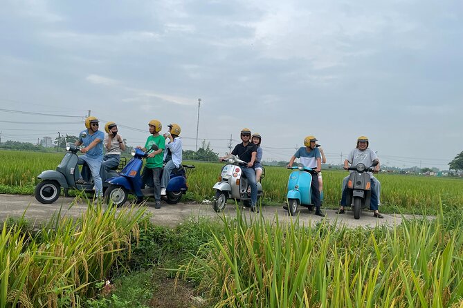 Exploring Vespa Tour Through Little Red River Delta - Long Bien Bridge, a working link to the countryside