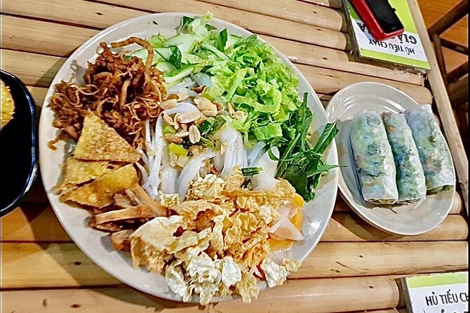 Female Rider | Street Food & Sightseeing By Motorbike - Ho Thi Ky Flower Market, a working local stop
