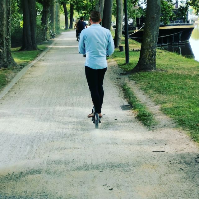 From Bruges to Damme: Private Electric Scooter tour - Riding toward Damme