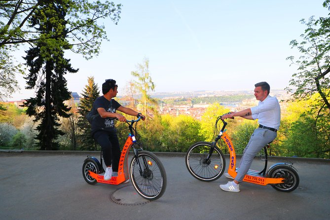 Grand City Tour of Prague on Cruiser e-Bikes or e-Scooters - Kampa Park, the Lennon Wall, and Charles Bridge