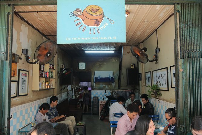 Half-Day Private Scooter Tour Including Light Meal - District 8 and the riverside side of Saigon
