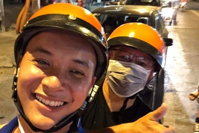 Hanoi Evening Vespa Food Tour 04hrs - Riding Thanh Niên Road between two lakes