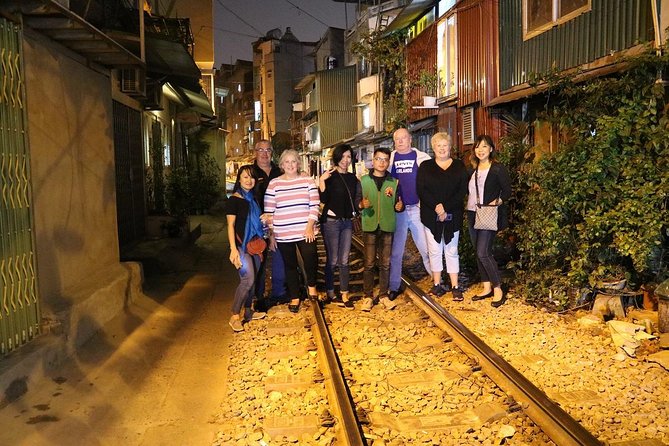 Hanoi Vespa After Dark Street food + Train Street+ Live Music - Train Street and egg coffee beside the tracks