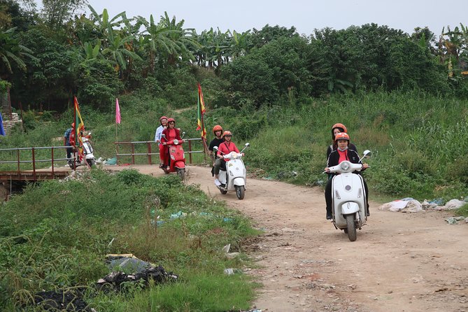 Hanoi Vespa Countryside Tour With Female Ao Dai Riders Half Day - Why a Vespa is the right way to leave Hanoi