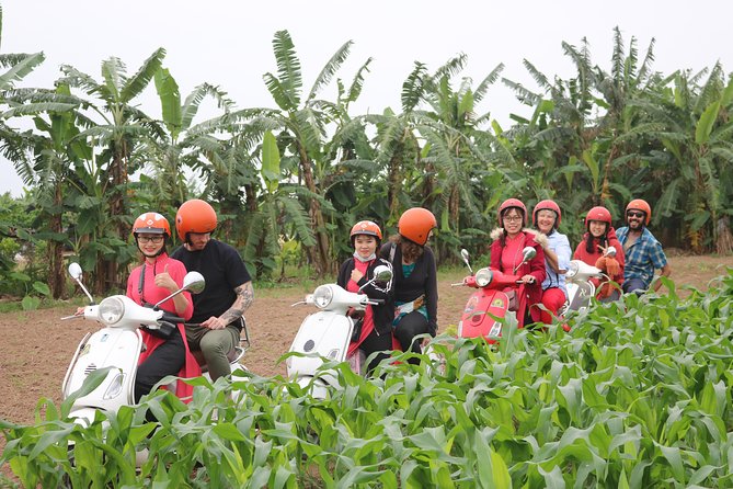Hanoi Vespa Countryside Tour With Female Ao Dai Riders Half Day - Crossing from city streets to farmland