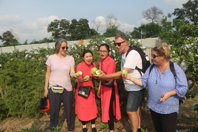 Hanoi Vespa Full Day City & Countryside with Female Ao Dai Riders - West Lake, the botanical garden, and the B52 site
