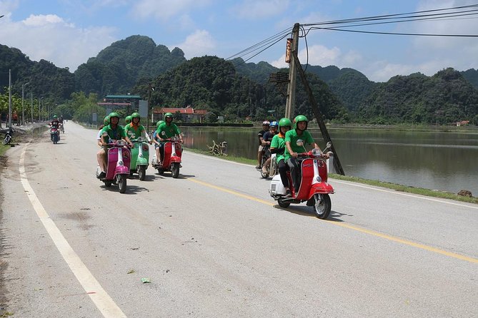 Hanoi Vespa Tour Explore Red River Delta & Rural Villages 5 Hours - Local food, fruit, and a family visit