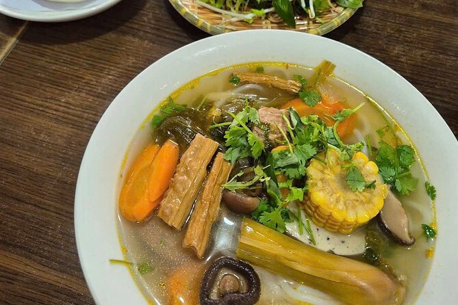 Ho Chi Minh City: Local Food Tour by Scooter with Vegan Option - Banh xeo with herbs at 335 Điện Biên Phủ