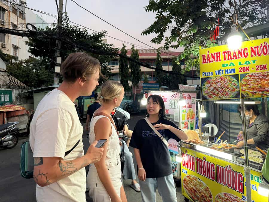 Ho Chi Minh: Local Food Tour by Scooter with Vegan Option - Stop three: night market snacks, fruit, and cold drinks