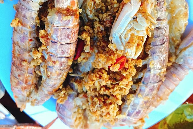 Hoi An Nightlife And Food Tour By Electric Scooter - Riding the oldest streets toward the river