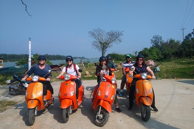 Hoi An Nightlife And Food Tour By Electric Scooter - Finishing beside the river with a cocktail