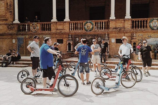 Kickscooter electric tour Sevilla - Passing the Antigua Tabacalera