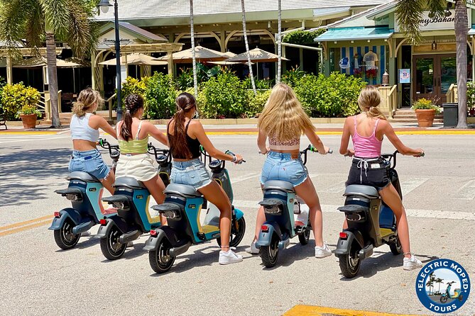 Naples Electric Moped Tour - Passing Palm Cottage in Old Naples