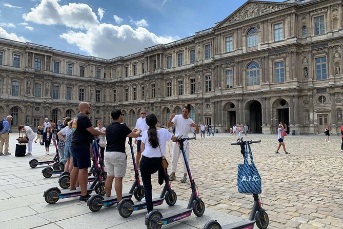 Paris City Tour by E-Scooter with Fun Guide (Small groups) - A riverside return past Paris landmarks