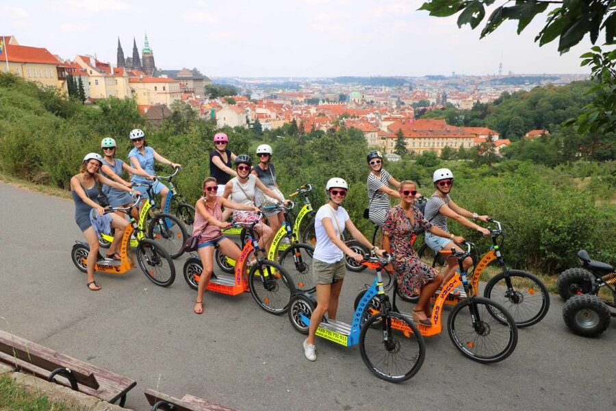 Prague: Tour by Electric Scooter or Cruiser eBike - Charles Bridge, the narrow alley, and Franz Kafka