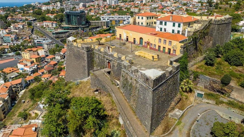 Private Vespa Tour Funchal & Câmara Lobos (3hrs) - Zona Velha shows Funchal at street level