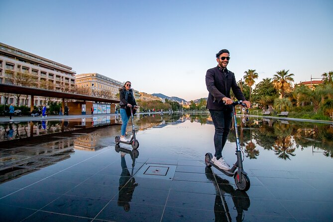 Rent scooters and electric bikes Nice - Returning through the National Theatre