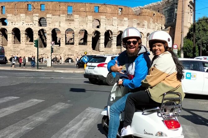 Rome by Vespa: Classic Rome Tour with Pick up - Piazza Venezia, the Colosseum, and the Roman Forum