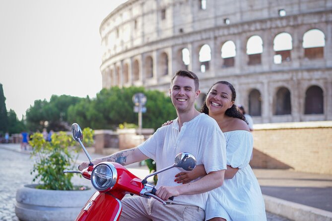 Rome's Easy Ride Vespa Tour with Pick Up and Drop Off - Starting at the Colosseum with a camera ready
