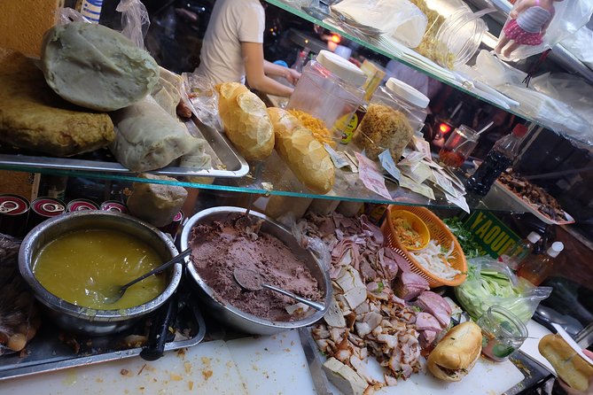 Saigon After Dark and Street Food by Motorbike and Scooter - The guides and the feel of a private tour