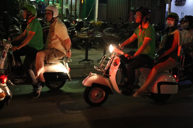 Saigon After Dark Vespa Street Food Tour + Live Music 4 hours - Banana cake on a street-food stop
