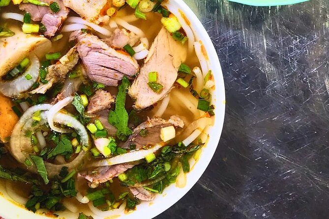 Saigon Food Tour by Scooter with Eleven Tastings - District 5 brings the bánh mì finale