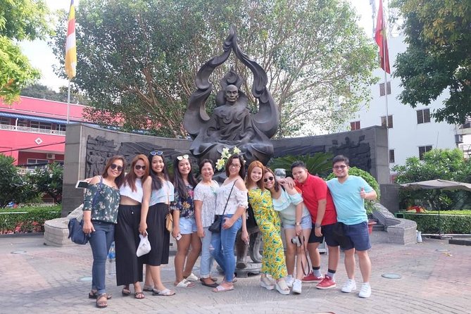 Saigon Morning City Historical Scooter Tour w Ao Dai Rider option - The Opera House and Nguyen Hue Street show modern Saigon